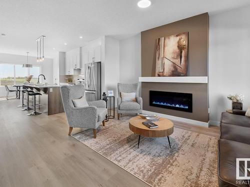 56 Penn Place, Spruce Grove, AB - Indoor Photo Showing Living Room With Fireplace