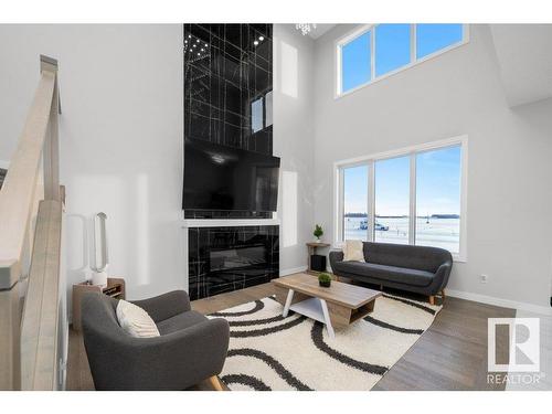 3709 41 Avenue, Beaumont, AB - Indoor Photo Showing Living Room With Fireplace