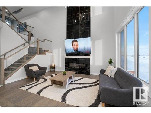 3709 41 Avenue, Beaumont, AB - Indoor Photo Showing Living Room With Fireplace