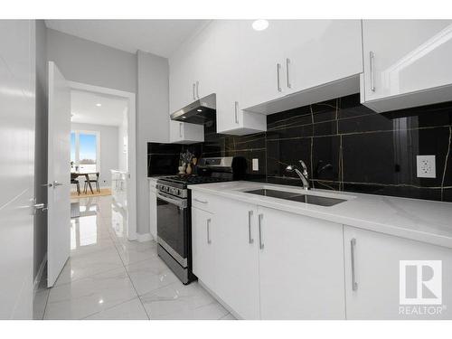 3709 41 Avenue, Beaumont, AB - Indoor Photo Showing Kitchen With Double Sink