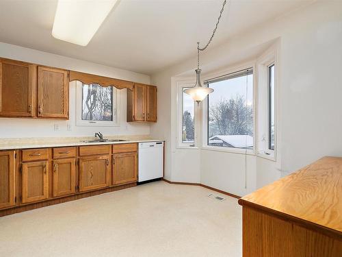 10632 10 Avenue, Edmonton, AB - Indoor Photo Showing Kitchen With Double Sink