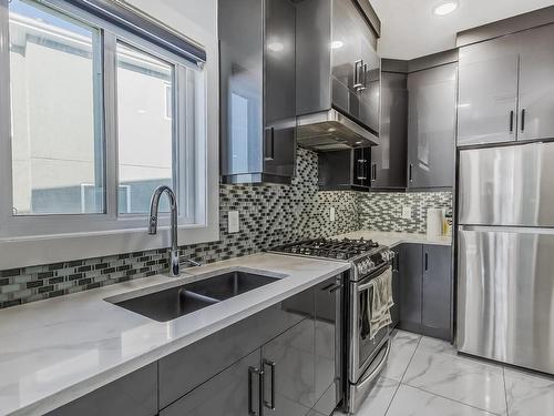 1448 25 Street, Edmonton, AB - Indoor Photo Showing Kitchen With Double Sink With Upgraded Kitchen