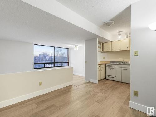 313 10160 114 Street, Edmonton, AB - Indoor Photo Showing Kitchen With Double Sink