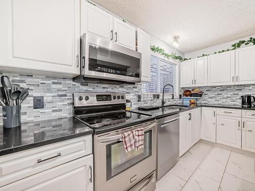 1217 76 Street Sw, Edmonton, AB - Indoor Photo Showing Kitchen With Stainless Steel Kitchen With Upgraded Kitchen