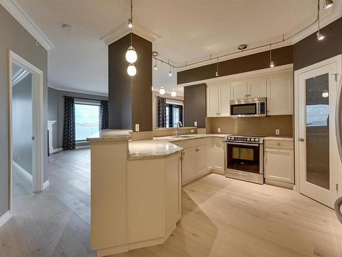 408 10108 125 Street, Edmonton, AB - Indoor Photo Showing Kitchen With Stainless Steel Kitchen