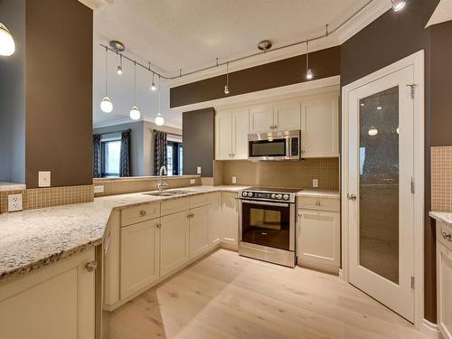 408 10108 125 Street, Edmonton, AB - Indoor Photo Showing Kitchen With Double Sink