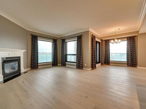 408 10108 125 Street, Edmonton, AB - Indoor Photo Showing Living Room With Fireplace