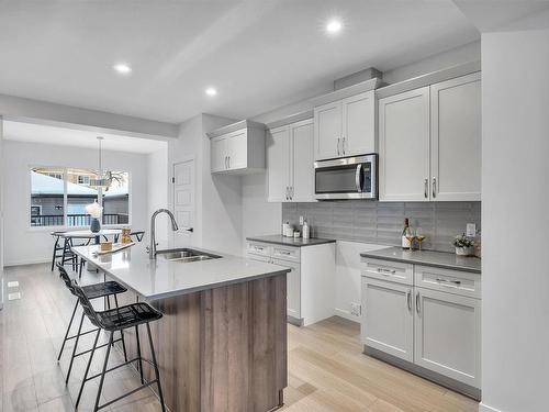 4637 114 Avenue, Edmonton, AB - Indoor Photo Showing Kitchen With Double Sink With Upgraded Kitchen