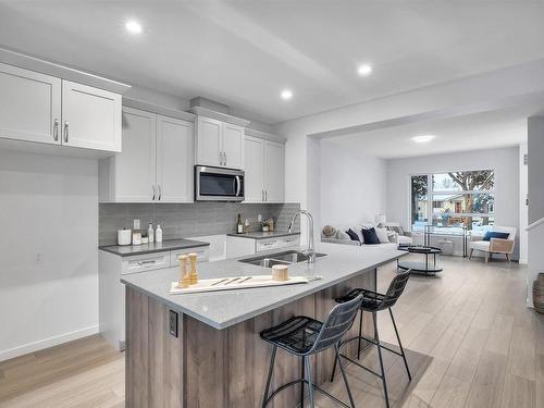 4637 114 Avenue, Edmonton, AB - Indoor Photo Showing Kitchen With Double Sink