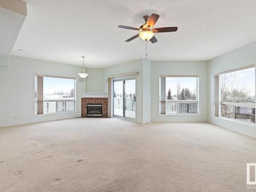 410 51 Eldorado Drive, St. Albert, AB - Indoor Photo Showing Living Room With Fireplace