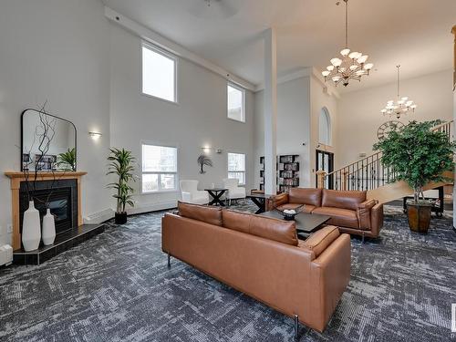 203 1320 Rutherford Road, Edmonton, AB - Indoor Photo Showing Other Room With Fireplace