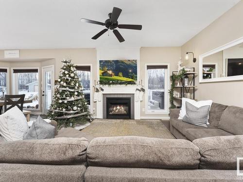 21-42011 Twp Rd 624, Rural Bonnyville M.D., AB - Indoor Photo Showing Living Room With Fireplace