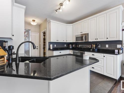 21-42011 Twp Rd 624, Rural Bonnyville M.D., AB - Indoor Photo Showing Kitchen With Double Sink