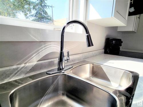 12018 77 Street Nw, Edmonton, AB - Indoor Photo Showing Kitchen With Double Sink