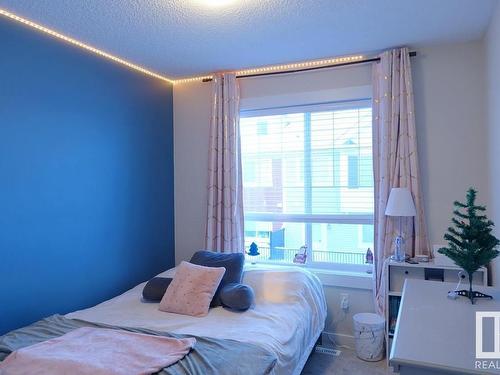 2206 8530 94 Street, Fort Saskatchewan, AB - Indoor Photo Showing Bedroom