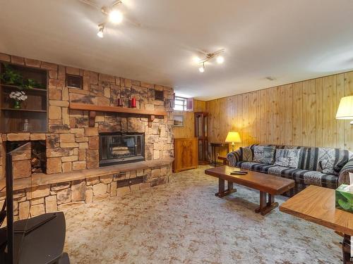 3131 74 Street, Edmonton, AB - Indoor Photo Showing Living Room With Fireplace