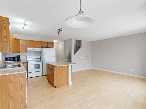 6212 1A Avenue, Edmonton, AB - Indoor Photo Showing Kitchen With Double Sink