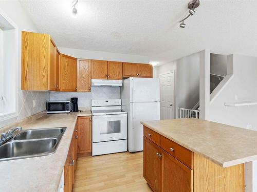 6212 1A Avenue, Edmonton, AB - Indoor Photo Showing Kitchen With Double Sink