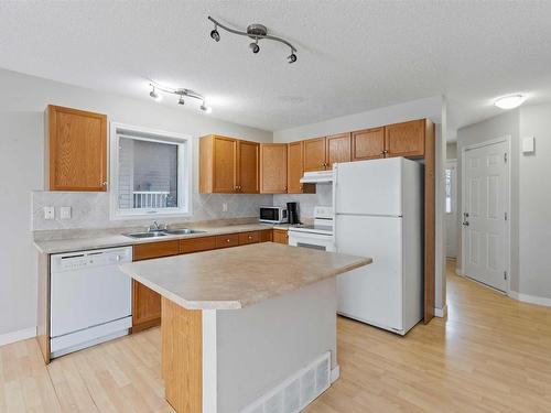 6212 1A Avenue, Edmonton, AB - Indoor Photo Showing Kitchen With Double Sink