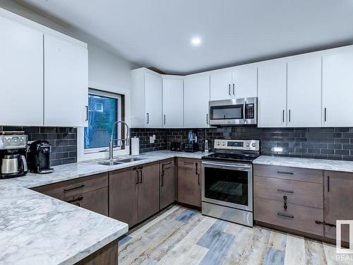 7502 155 Street, Edmonton, AB - Indoor Photo Showing Kitchen With Double Sink