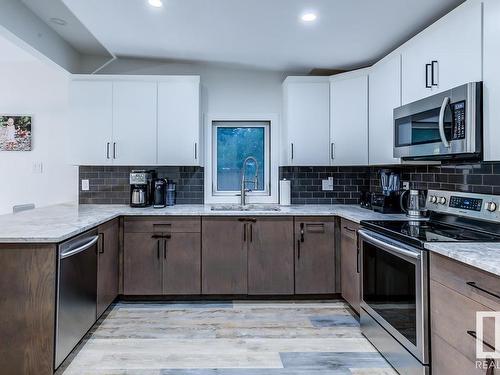 7502 155 Street, Edmonton, AB - Indoor Photo Showing Kitchen With Double Sink