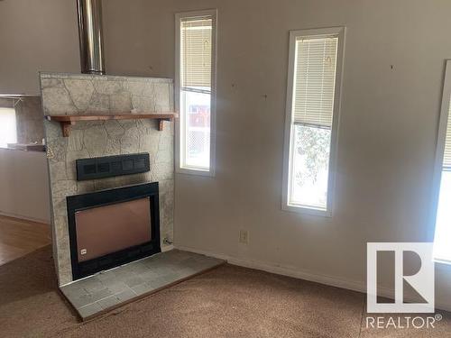 5912 49 Avenue, Rural Lac Ste. Anne County, AB - Indoor Photo Showing Other Room With Fireplace