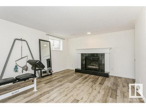 17927 62C Avenue, Edmonton, AB - Indoor Photo Showing Living Room With Fireplace