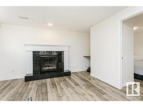 17927 62C Avenue, Edmonton, AB - Indoor Photo Showing Living Room With Fireplace