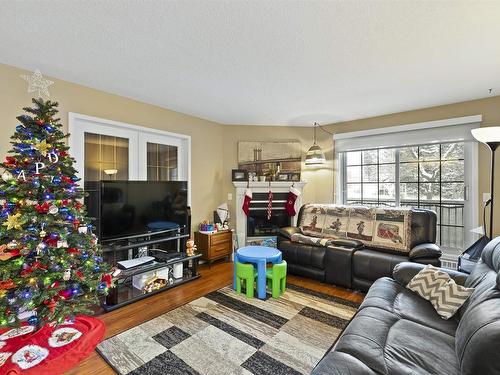 408 3 Perron Street, St. Albert, AB - Indoor Photo Showing Living Room