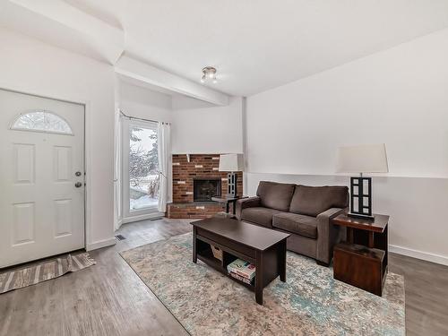 3949 62 Street, Edmonton, AB - Indoor Photo Showing Living Room With Fireplace