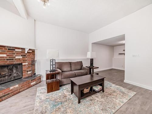 3949 62 Street, Edmonton, AB - Indoor Photo Showing Living Room With Fireplace