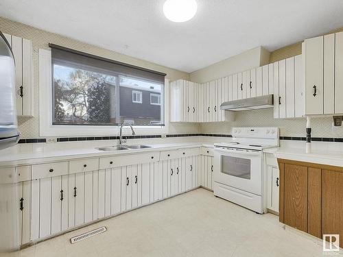 5735 144 Avenue, Edmonton, AB - Indoor Photo Showing Kitchen With Double Sink