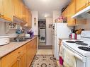 203 51 Brown Street, Stony Plain, AB  - Indoor Photo Showing Kitchen With Double Sink 