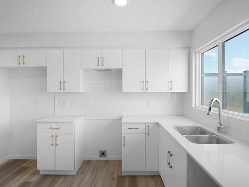 47 1025 Secord Promenade, Edmonton, AB - Indoor Photo Showing Kitchen With Double Sink