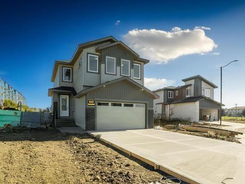 144 Creekside Lane, Leduc, AB - Outdoor With Facade