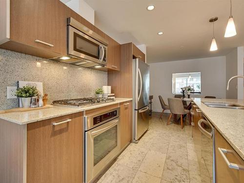 303 2510 109 Street, Edmonton, AB - Indoor Photo Showing Kitchen With Double Sink With Upgraded Kitchen