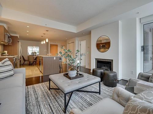 303 2510 109 Street, Edmonton, AB - Indoor Photo Showing Living Room With Fireplace