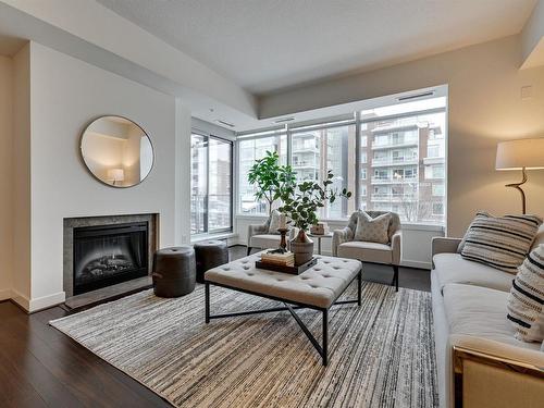 303 2510 109 Street, Edmonton, AB - Indoor Photo Showing Living Room With Fireplace