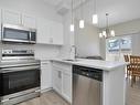 47 603 Orchards Boulevard, Edmonton, AB  - Indoor Photo Showing Kitchen With Stainless Steel Kitchen With Double Sink With Upgraded Kitchen 