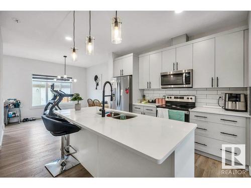 20738 99B Avenue, Edmonton, AB - Indoor Photo Showing Kitchen With Double Sink With Upgraded Kitchen