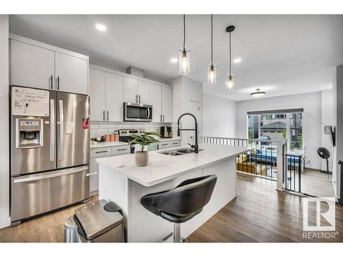 20738 99B Avenue, Edmonton, AB - Indoor Photo Showing Kitchen With Double Sink With Upgraded Kitchen