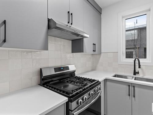 8820 181 Avenue, Edmonton, AB - Indoor Photo Showing Kitchen With Double Sink