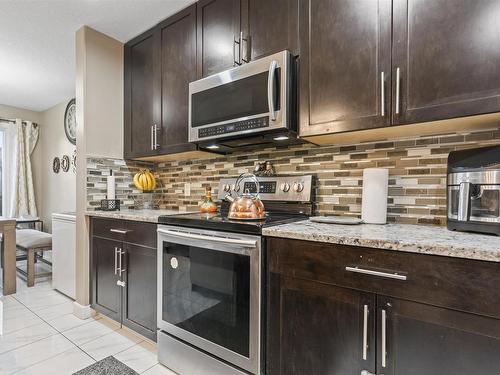 15104 31 Street Nw, Edmonton, AB - Indoor Photo Showing Kitchen With Upgraded Kitchen