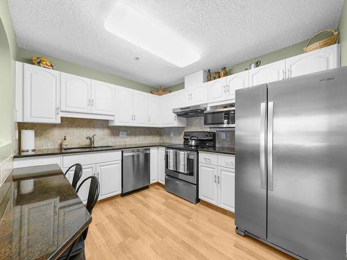 212 10610 76 Street Nw, Edmonton, AB - Indoor Photo Showing Kitchen