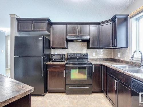 7669 Schmid Crescent, Edmonton, AB - Indoor Photo Showing Kitchen With Double Sink