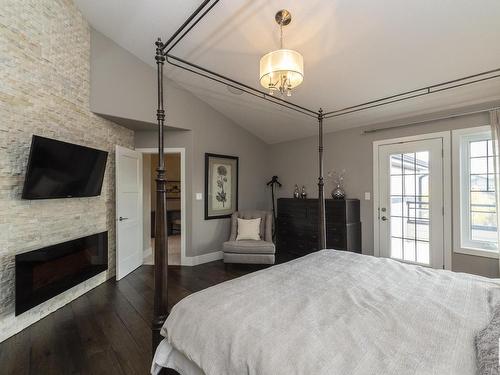 605 Howatt Drive, Edmonton, AB - Indoor Photo Showing Bedroom With Fireplace