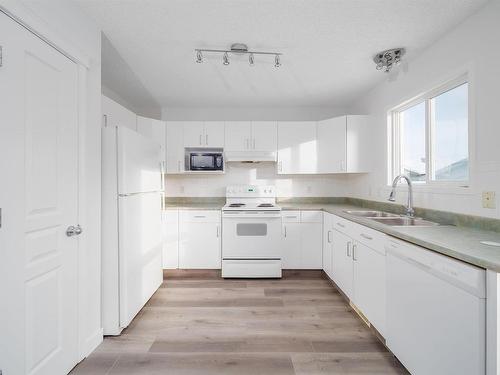 315 Brintnell Boulevard, Edmonton, AB - Indoor Photo Showing Kitchen With Double Sink