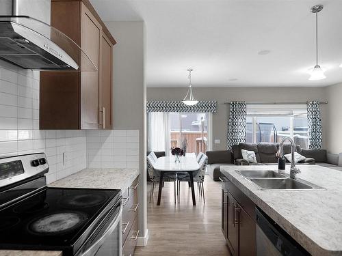 16726 64 Street, Edmonton, AB - Indoor Photo Showing Kitchen With Double Sink With Upgraded Kitchen