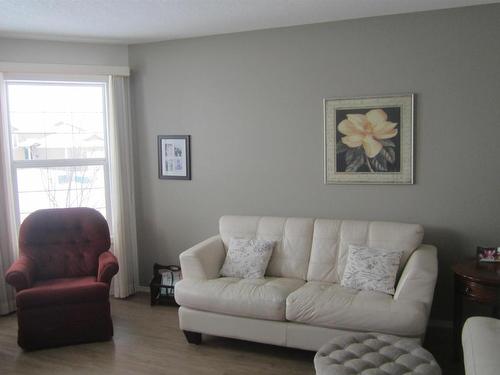 150 Pipestone Drive, Millet, AB - Indoor Photo Showing Living Room