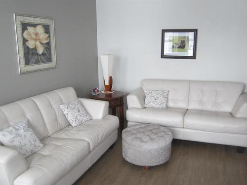 150 Pipestone Drive, Millet, AB - Indoor Photo Showing Living Room